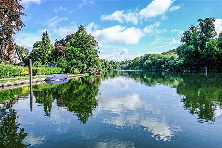 Traveling Upstream on a River at Dusk: An Enchanting Experience